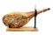 Whole jamon on a wooden stand