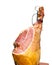 Whole jamon on a wooden stand isolated on white background