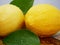 Whole lemons and leaf. Fruit image