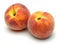 Whole peaches on white background