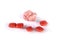 Whole pieces and chewed red bubble gum isolated over white