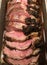 Whole prime rib roast sliced