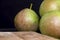 Whole ripe green pears, close up