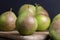 Whole ripe green pears, close up