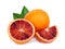 Whole and slices blood orange with green leaf isolated