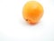 A whole tangerine on a white background. Fruit of a citrus plant