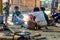 Whole village cooking and eating together Laos