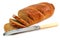 Whole wheat bread and table knife isolated