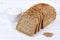 Whole wheat grain bread slice slices sliced loaf on wooden board