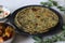 Whole wheat methi thepla rolls with paneer capsicum filling and a bowl of masala curd