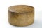 Whole wheel of sheep milk cheese.