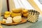 Whole wheels of yellow cheese, homemade on table display