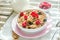 Wholegrain granola with milk and fresh berries