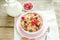 Wholegrain granola with milk and fresh berries