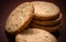 Wholegrain oatmeal cookie on wooden table with copy space.