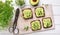 Wholegrain toasts with avocado spread and microgreen