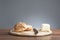 Wholemeal bread roll with caraway seeds, butter, knife