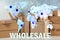 Wholesale business. World map and parcel boxes on background