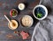 Wholesome breakfast. There are plates of food on the wooden table. Oatmeal porridge with berries. Proper nutrition.