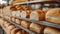 Wholesome Delights: A Bread Bakery Food Factory Showcasing Fresh White Bread on Shelves During Manufacturing Process