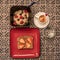 Wholesome and healthy oatmeal, multigrain bread and fresh fruit with espresso breakfast