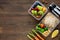 Wholesome nutrient rich food set in take away boxes on wood table background with copy space