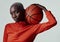 Whos got game Is that even a question. Studio shot of an attractive young woman playing basketball against a grey