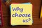 Why choose us written on note