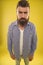 Why so serious. Beard fashion and barber concept. Man bearded hipster beard yellow background. Barber tips maintain