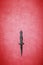 Wiccan dagger on a red background