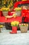Wicker basket with beautiful flowers. Tulips, mimosas. A bright red truck brought a lot of flowers