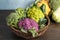 Wicker basket with different cabbages