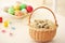 Wicker basket with quail eggs prepared for Easter