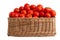 Wicker basket with red tomatoes on a white background, isolate. Fresh organic vegetables, natural
