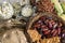 Wicker basket with typical Brazilian foods like pine nuts, popcorn, brown sugar, peanuts and green corn