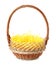 Wicker basket with yellow filler isolated on white. Easter item