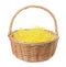 Wicker basket with yellow filler isolated on white. Easter item