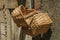 Wicker baskets tied together and hung on a wall of Monsanto