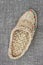 Wicker bast shoe on linen fabric