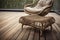 wicker lounge chair and footrest on wooden decking