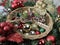 wicker peace basket, Christmas decorations (sparkly red, green, silver, gold balls)