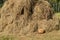 Wicker picnic basket and a haystack - a beautiful rural background in Sunny summer day