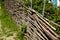 Wicker rustic fence in the garden