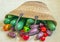 Wicker shopping bag filled with fresh vegetables from the market