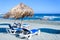 Wicker umbrella on the beach