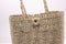 Wickerwork woman bag texture made from dry sedge isolate on white  background.Closeup surface texture of hand made craft work papy