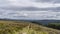 Wicklow way landscape, Glendalough vale, with a girl in the path