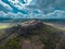 Wide Aerial drone panorama of magnificent village of Motovun in Croatian Istria on a sunny day with cute fluffy clouds. Idyllic