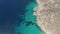 Wide Aerial Overhead Top Down View of Greek Island Coast in Milos in Summer with Turquoise Blue Aegean Sea