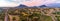 Wide aerial panorama of Grampians mountains and countryside at sunset.